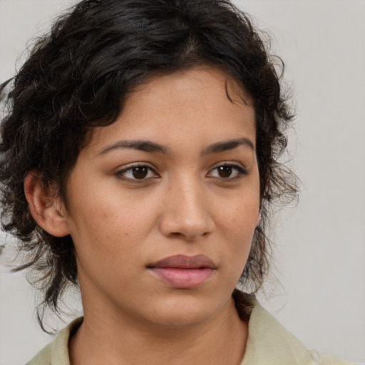 Neutral latino young-adult female with medium  brown hair and brown eyes