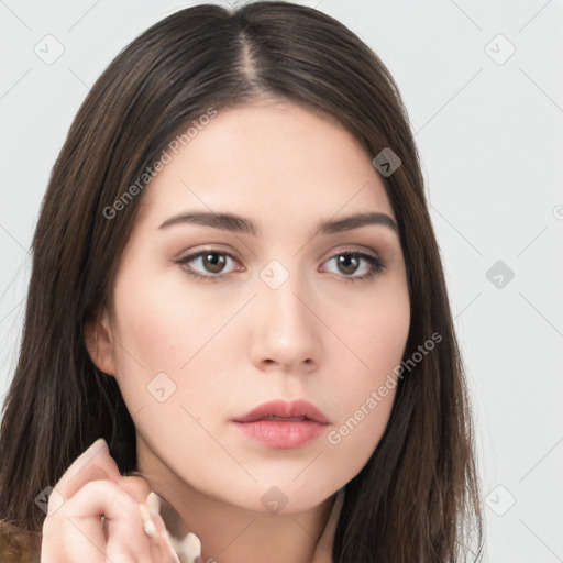 Neutral white young-adult female with long  brown hair and brown eyes