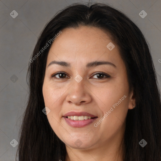 Joyful latino young-adult female with long  brown hair and brown eyes