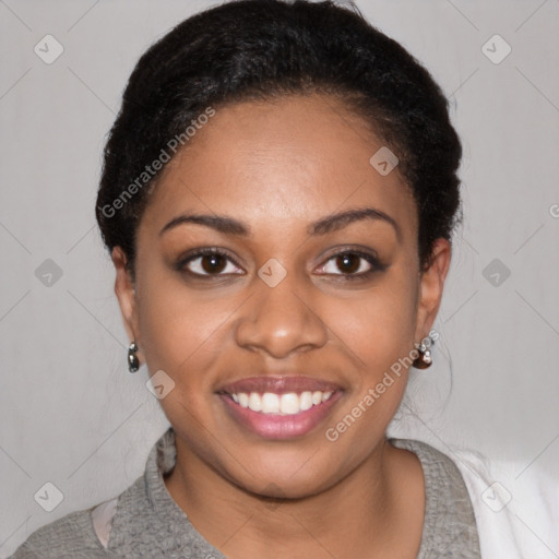 Joyful latino young-adult female with short  black hair and brown eyes