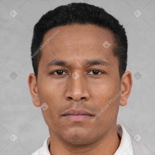 Neutral latino young-adult male with short  black hair and brown eyes