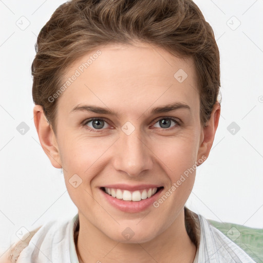 Joyful white young-adult female with short  brown hair and grey eyes