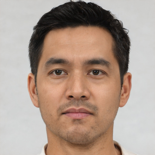 Neutral asian young-adult male with short  black hair and brown eyes