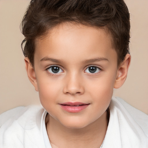 Joyful white child female with short  brown hair and brown eyes