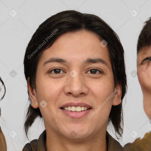 Joyful asian adult female with medium  brown hair and brown eyes