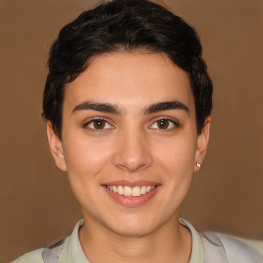 Joyful white young-adult female with short  brown hair and brown eyes