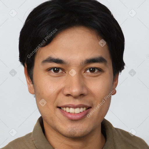 Joyful latino young-adult male with short  black hair and brown eyes