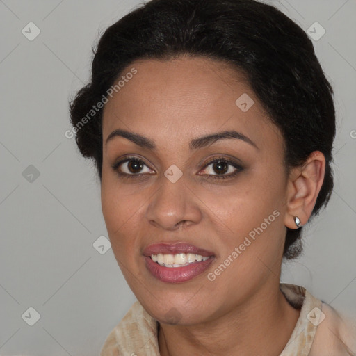 Joyful black young-adult female with medium  brown hair and brown eyes