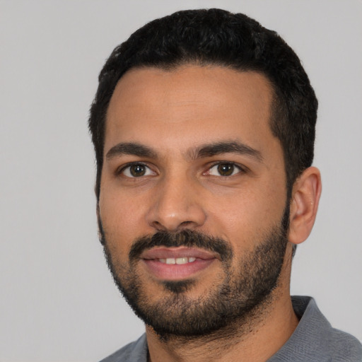 Neutral latino young-adult male with short  black hair and brown eyes