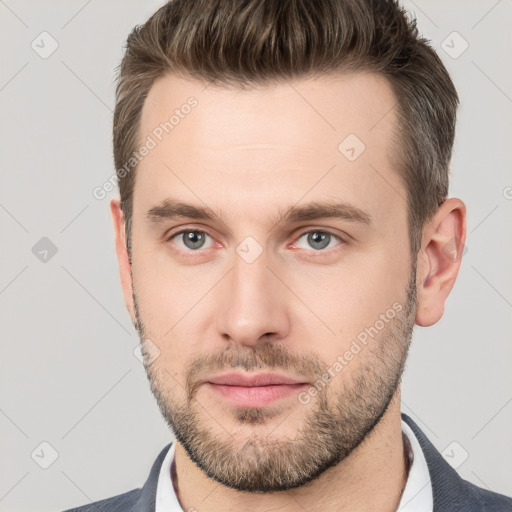 Neutral white young-adult male with short  brown hair and brown eyes