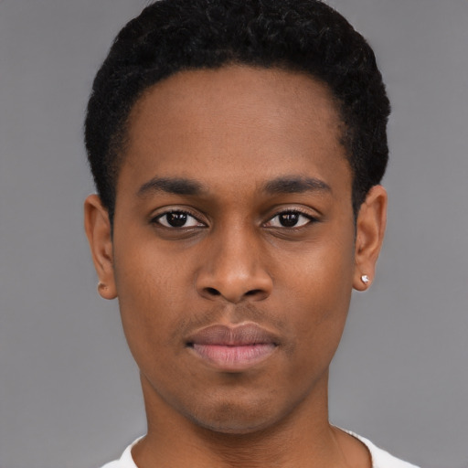 Neutral black young-adult male with short  black hair and brown eyes