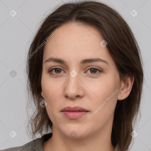 Neutral white young-adult female with medium  brown hair and grey eyes