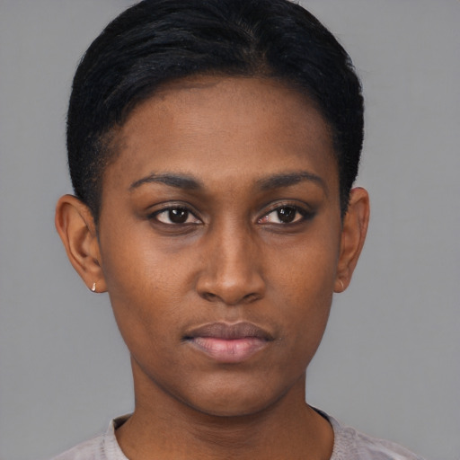 Neutral black young-adult female with short  black hair and brown eyes