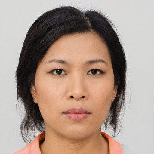 Neutral asian young-adult female with medium  black hair and brown eyes