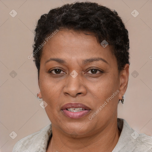 Joyful latino adult female with short  brown hair and brown eyes