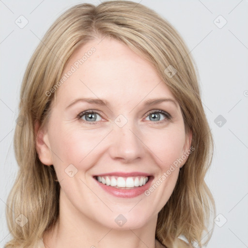 Joyful white young-adult female with medium  brown hair and blue eyes