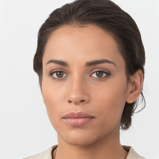 Neutral white young-adult female with medium  brown hair and brown eyes