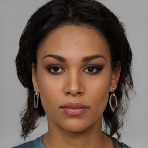 Neutral latino young-adult female with medium  brown hair and brown eyes