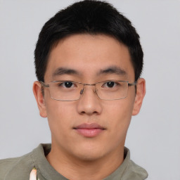 Neutral asian young-adult male with short  brown hair and brown eyes