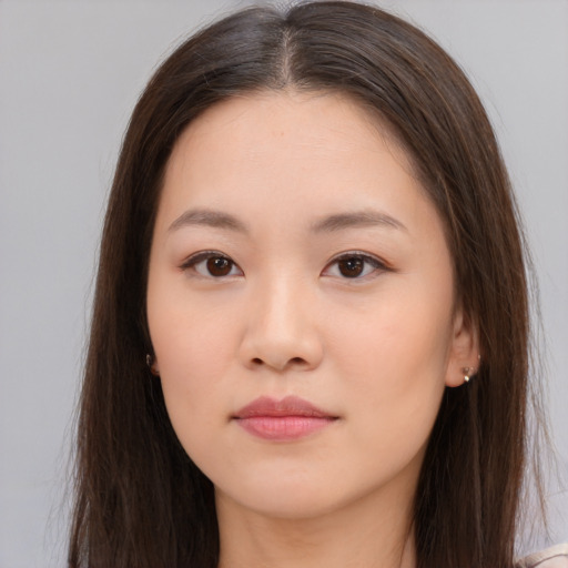 Neutral asian young-adult female with long  brown hair and brown eyes