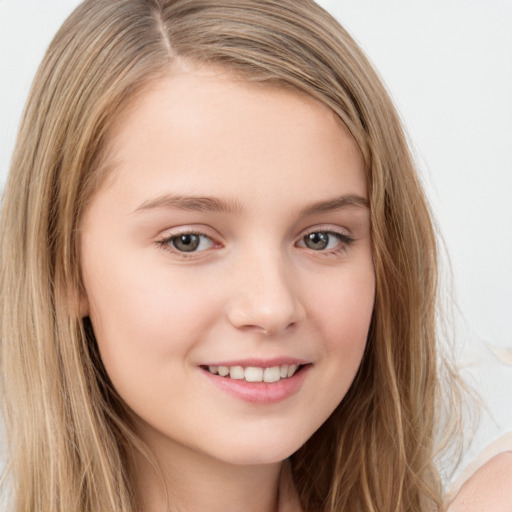 Joyful white child female with long  brown hair and brown eyes