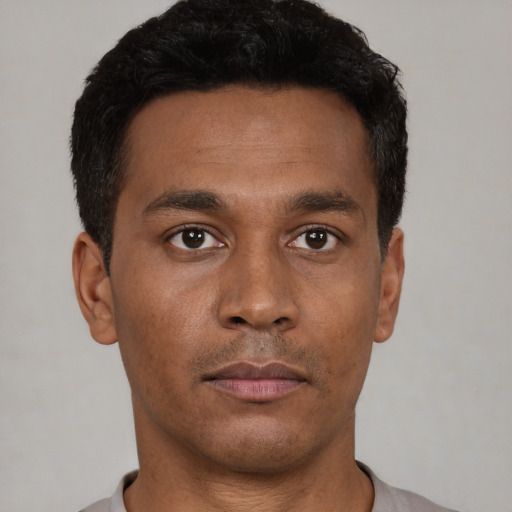 Neutral black young-adult male with short  black hair and brown eyes