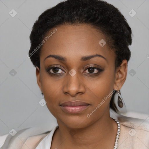 Joyful black young-adult female with short  black hair and brown eyes