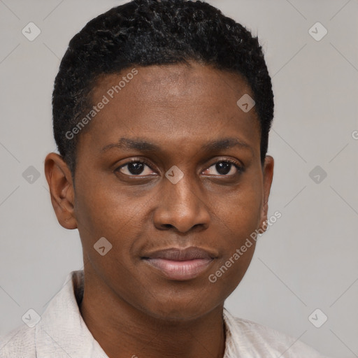 Joyful black young-adult male with short  brown hair and brown eyes