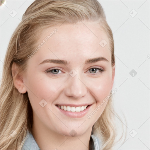 Joyful white young-adult female with long  brown hair and blue eyes