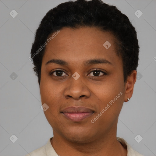 Joyful black young-adult female with short  brown hair and brown eyes