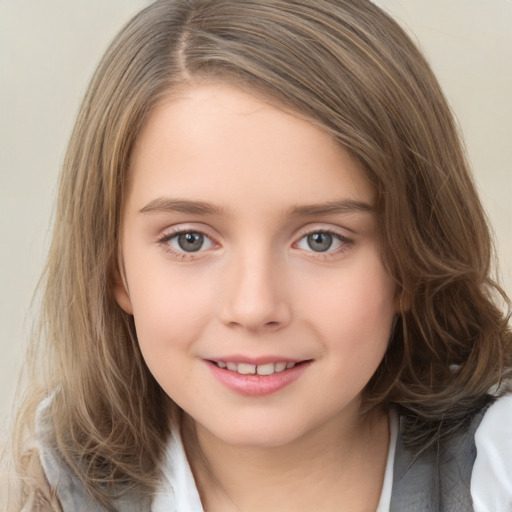 Joyful white child female with medium  brown hair and brown eyes