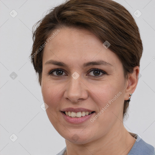 Joyful white young-adult female with medium  brown hair and grey eyes