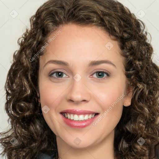 Joyful white young-adult female with medium  brown hair and green eyes