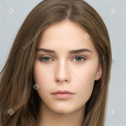 Neutral white young-adult female with long  brown hair and brown eyes