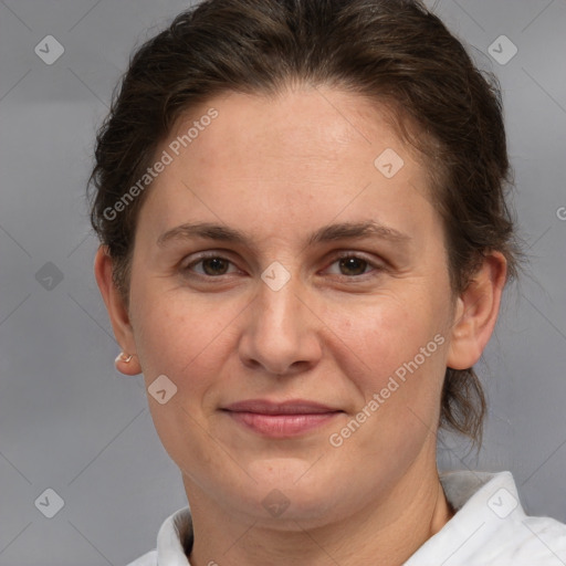 Joyful white adult female with short  brown hair and brown eyes