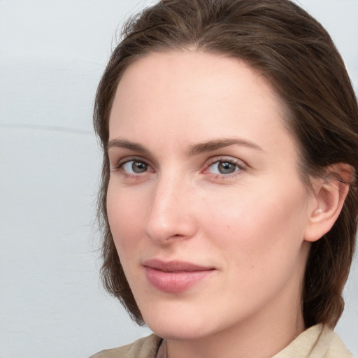 Neutral white young-adult female with medium  brown hair and grey eyes