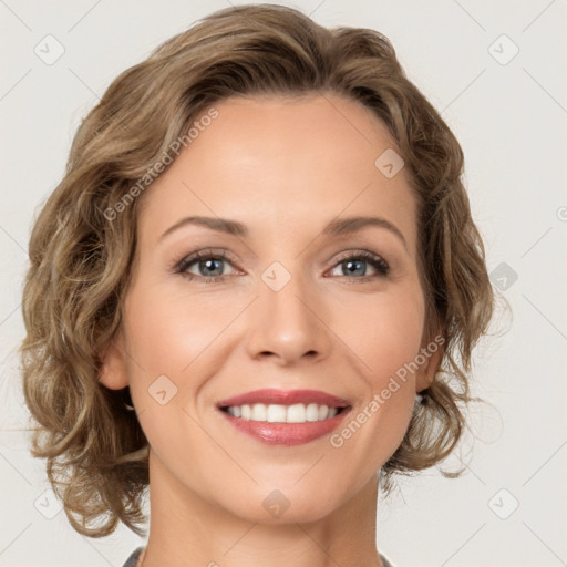 Joyful white young-adult female with medium  brown hair and green eyes