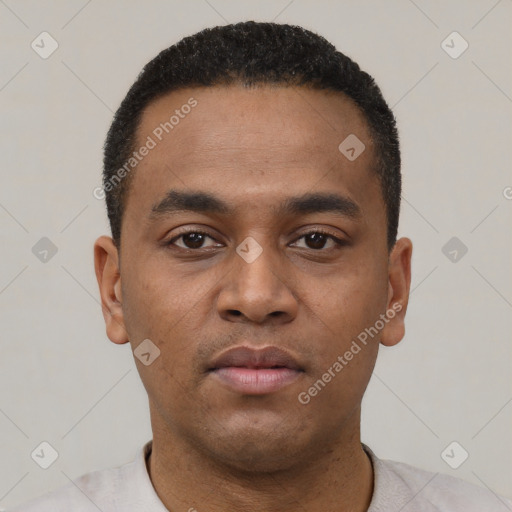 Neutral latino young-adult male with short  black hair and brown eyes