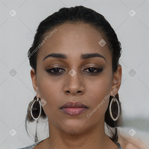 Neutral black young-adult female with long  brown hair and brown eyes