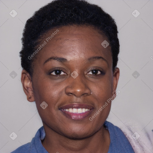 Joyful black young-adult female with short  brown hair and brown eyes