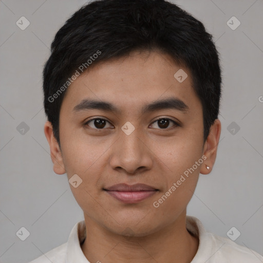 Joyful asian young-adult male with short  black hair and brown eyes