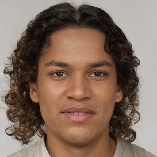 Joyful white young-adult male with medium  brown hair and brown eyes