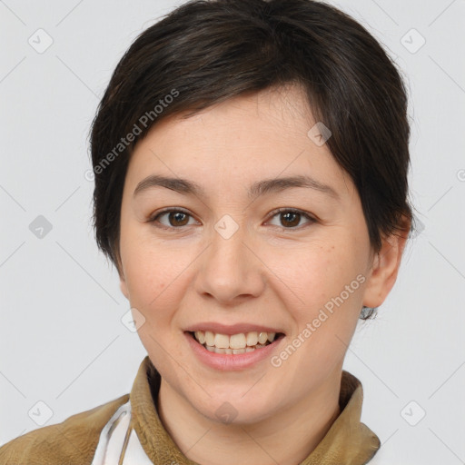 Joyful white young-adult female with medium  brown hair and brown eyes