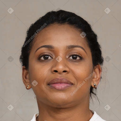 Joyful black young-adult female with short  brown hair and brown eyes