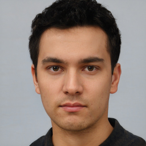 Neutral white young-adult male with short  black hair and brown eyes