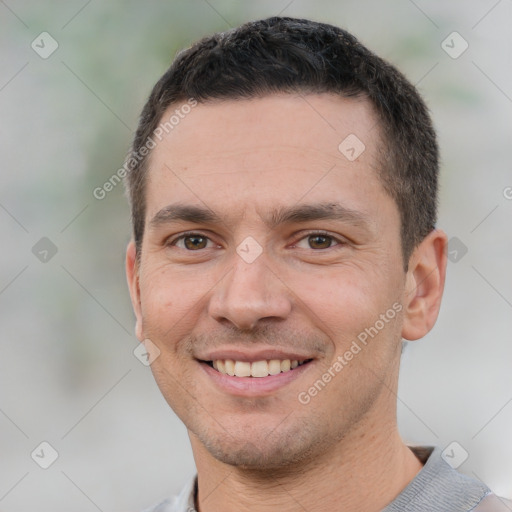 Joyful white young-adult male with short  brown hair and brown eyes