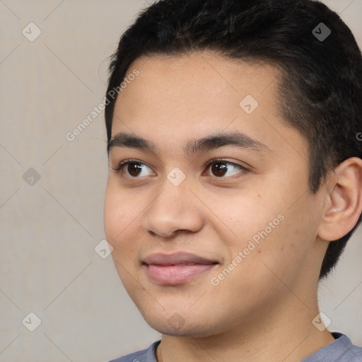 Joyful white young-adult male with short  black hair and brown eyes