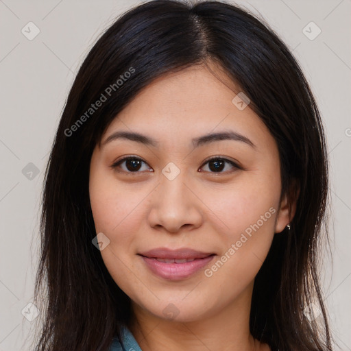 Joyful asian young-adult female with long  brown hair and brown eyes