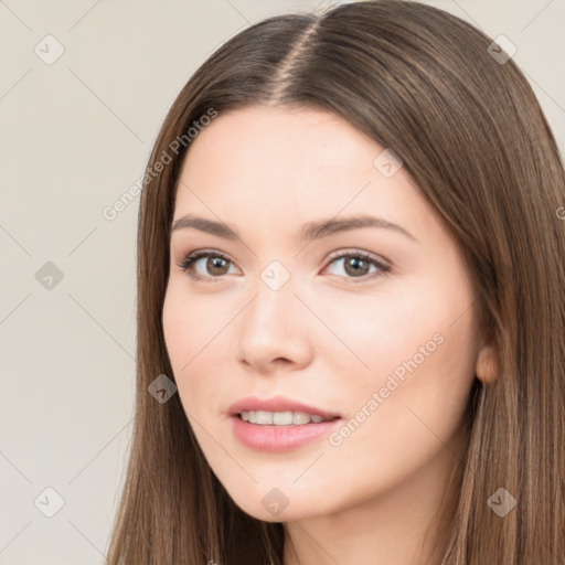 Neutral white young-adult female with long  brown hair and brown eyes