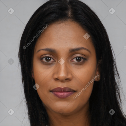 Joyful latino young-adult female with long  black hair and brown eyes